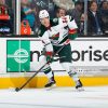 SAN JOSE, CA - DECEMBER 12: Brett Bulmer #54 of the Minnesota Wild skates with the puck against the San Jose Sharks at SAP Center on December 12, 2013 in San Jose, California. (Photo by Rocky Widner/Getty Image)